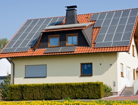 Residential rooftop solar panels on a family home