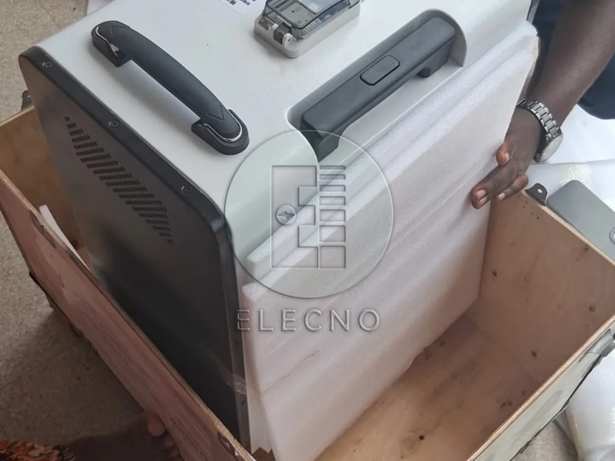 5kWh portable all-in-one energy storage unit being unpacked in Burundi