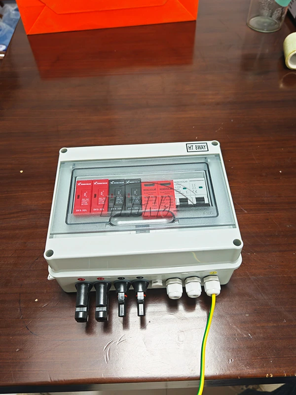 PV protection enclosure with transparent cover, internal protective devices, connectors and earth lead
