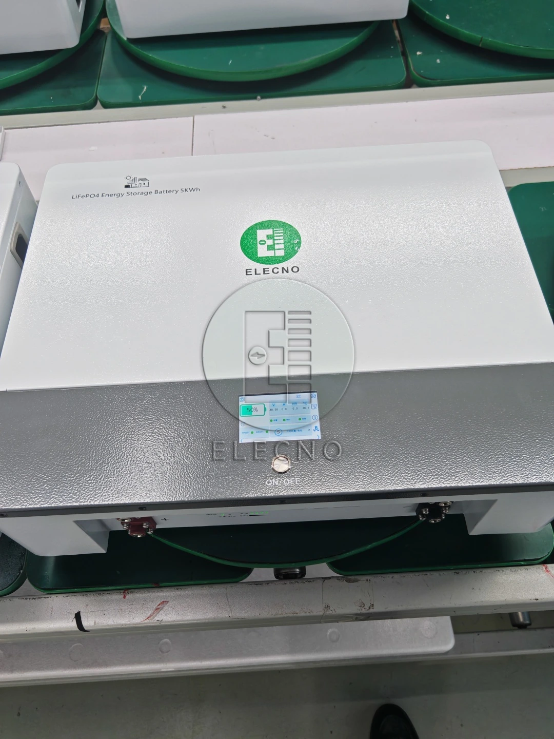 ELECNO compact battery enclosure and connection panel on the factory conveyor
