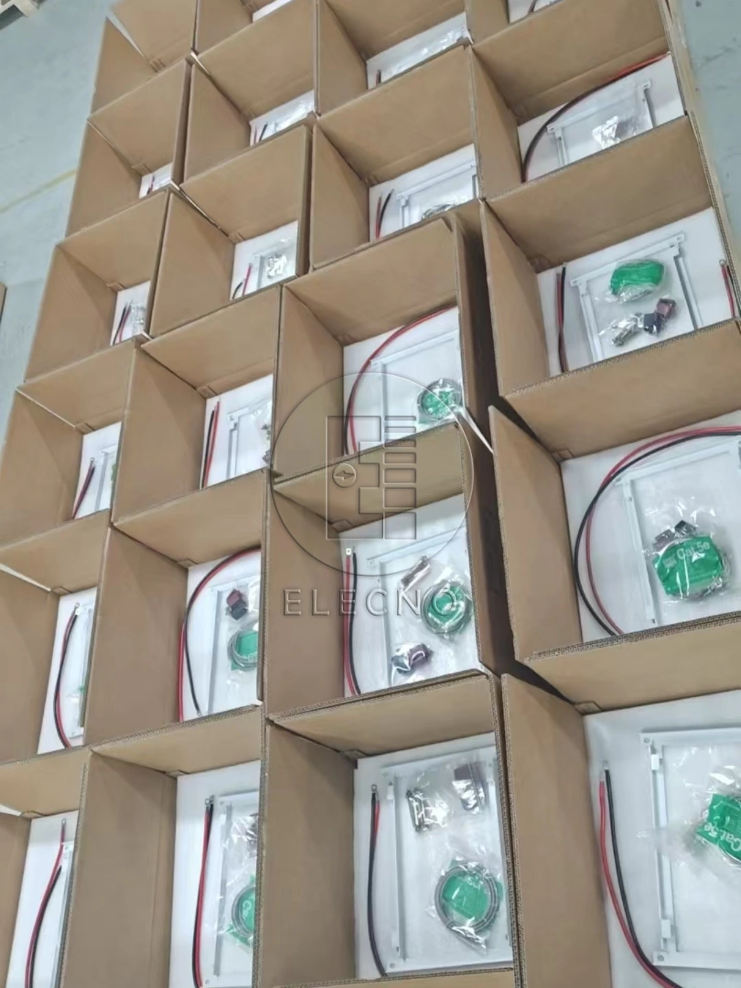Rows of battery cartons in the documented Colombia 100-unit shipment preparation