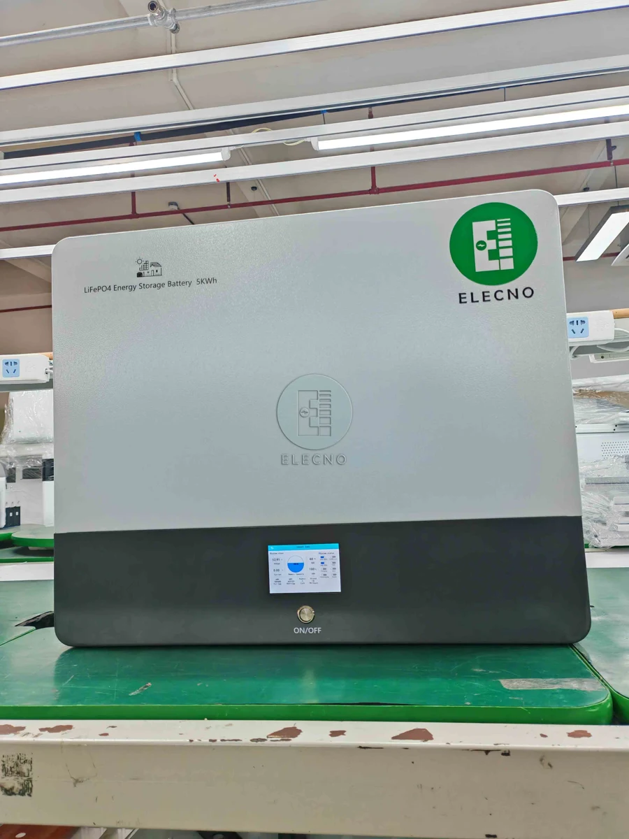 Front view of ELECNO 5kWh LiFePO4 wall-mounted battery on factory bench