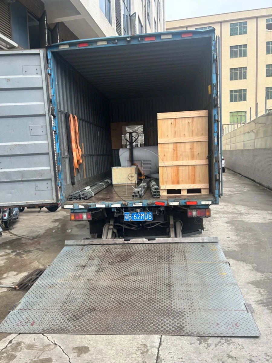 Wooden crates and equipment loaded on a truck for Ghana shipment