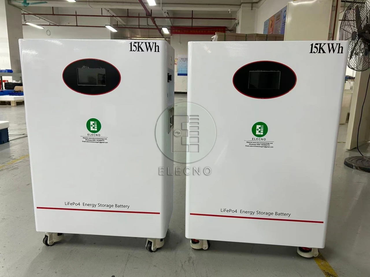 Two ELECNO floor-standing batteries with 15kWh markings photographed before the Ghana shipment