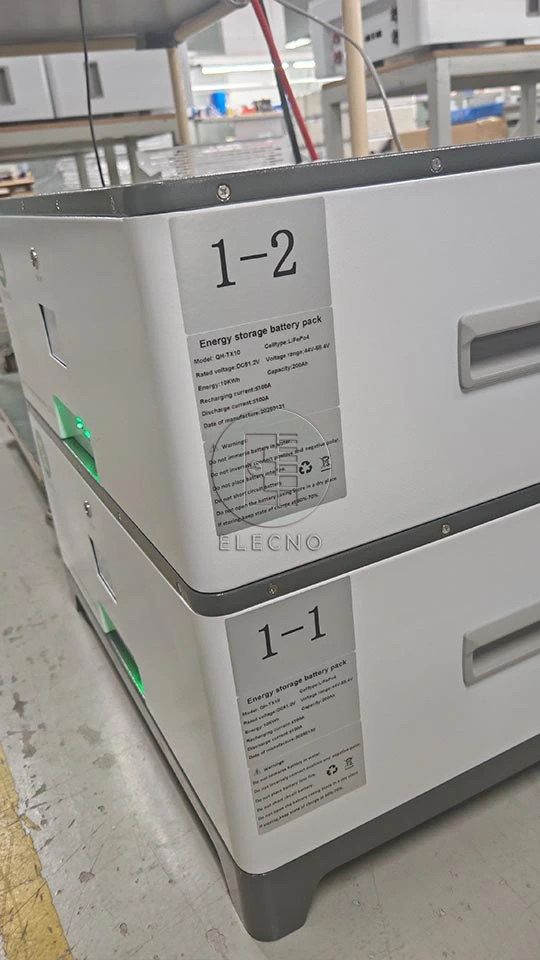 Specification labels and identification numbers on two stacked battery modules