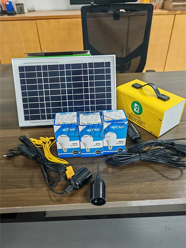 Compact ELECNO solar lighting kit with solar panel, yellow enclosure, bulb boxes and cables
