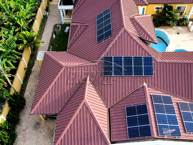 Aerial view of twenty solar panels installed on a villa roof in Ghana